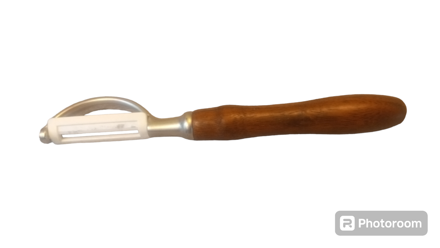 Ceramic edged Vegetable Peeler with Walnut Handle