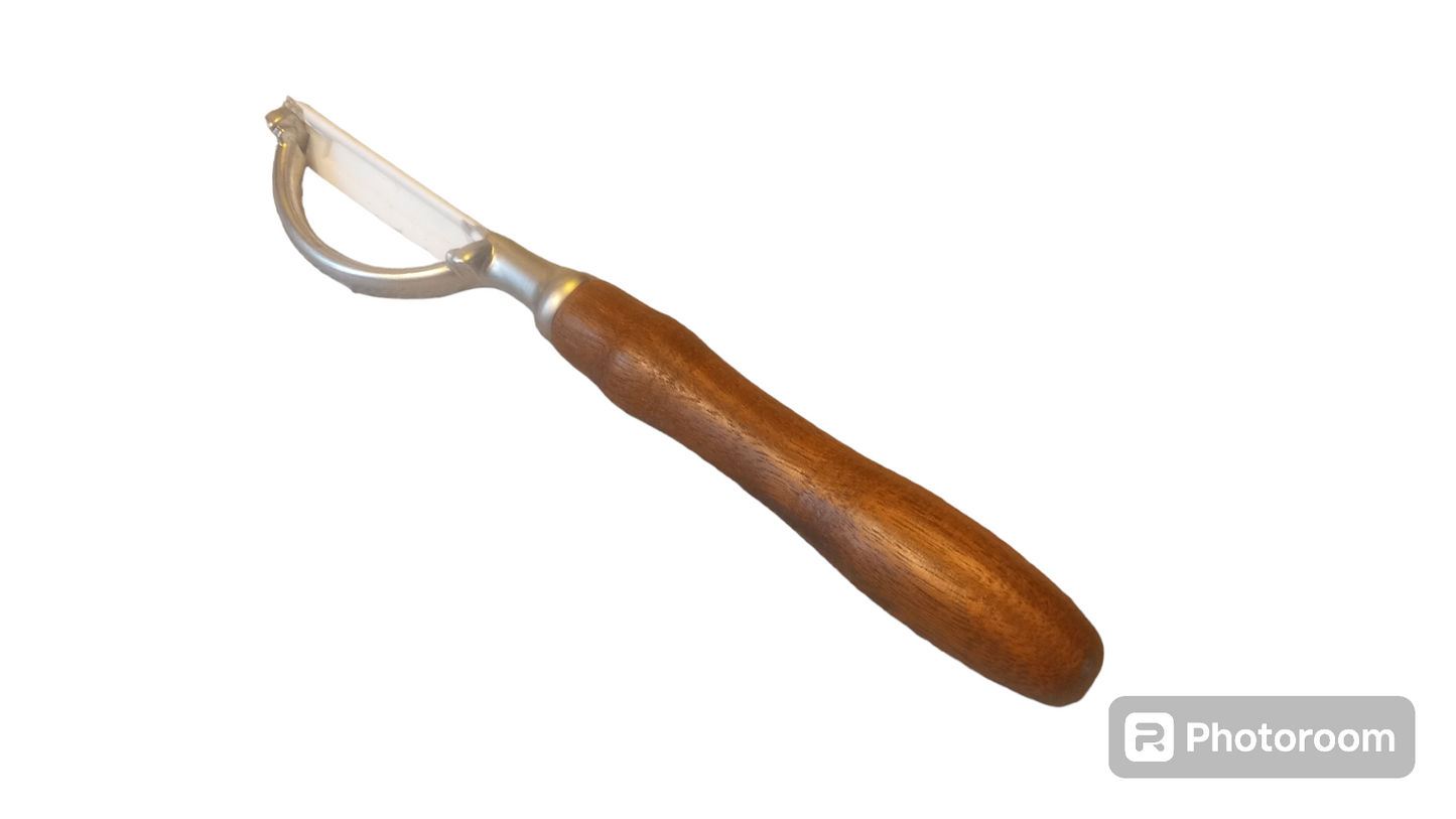 Ceramic edged Vegetable Peeler with Walnut Handle